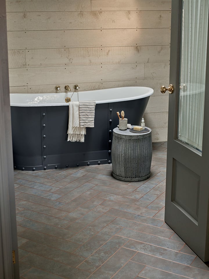 Amtico's Grey Burnished Metal in a Large Parquet laying pattern.
