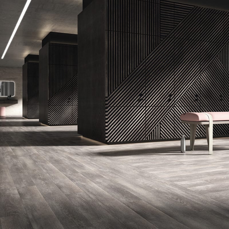Oak-effect flooring with a subtle silver hue in a large commercial space