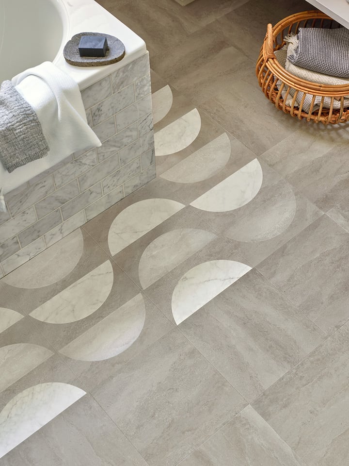 DC564 Arc Small as a border around bath tub, paired with Tempus Embrace in a Uniform Tile laying pattern.