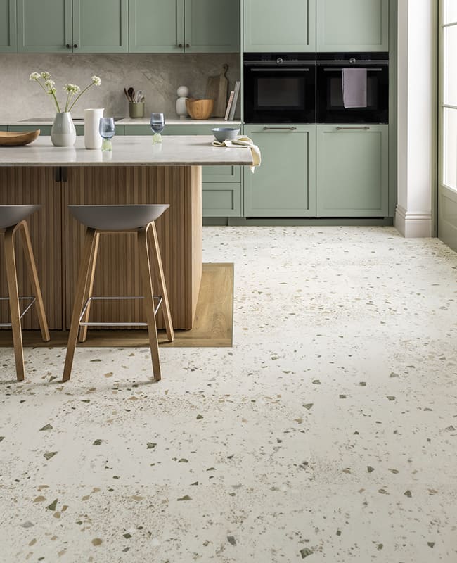 Amtico's Spacia Terrazzo in Garda is featured in kitchen space.