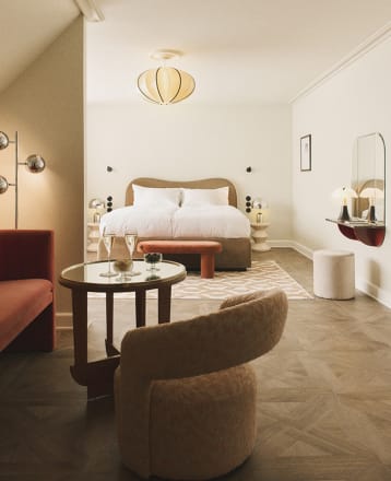 Hotel bedroom features Brushed Oak in French Weave creating nostalgic charm with modern sophistication