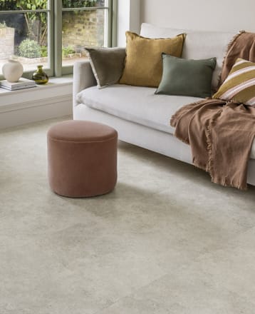 Seating area features Amtico Temple Stone in Broken Bond, from the Amtico Spacia collection.