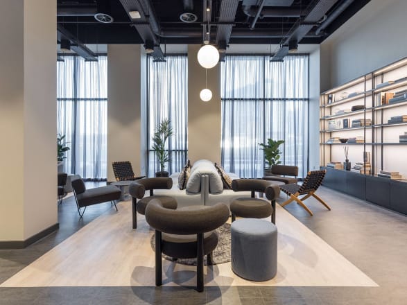 Amtico's Stria Volcanic and Shell Oak is used within the open plan seating area.