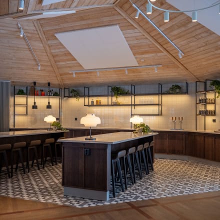 A hotel bar features Classic Argent from the Amtico Décor collection, creating an eye-catching zoned space.