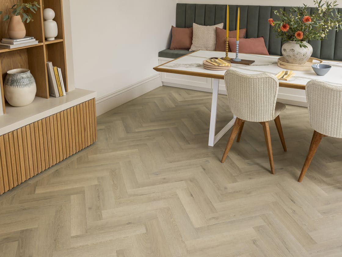 The dining room floor features Dawlish Oak - in a Large Parquet laying pattern.