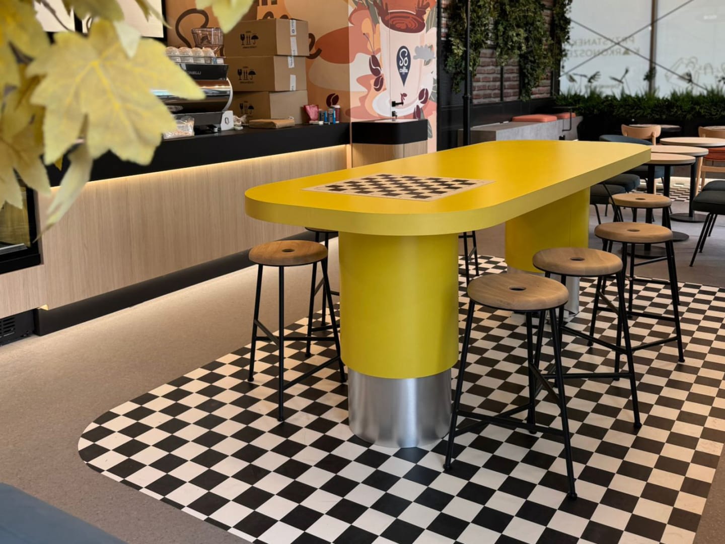 Cafe features Chequer Mono from the Amtico Décor collection.