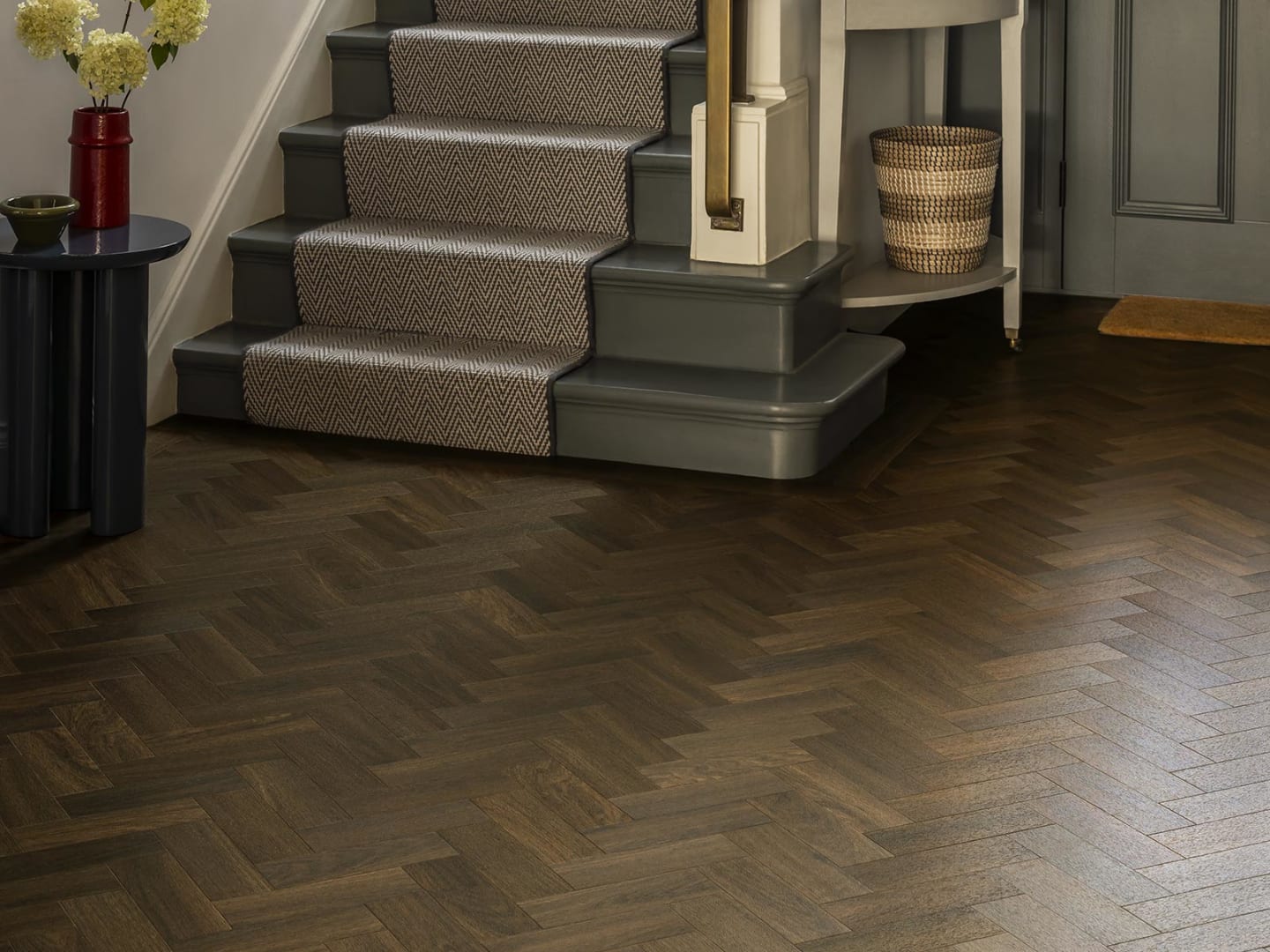 The Hallway floor features Saddler Oak, SS5W1240 in Small Parquet.