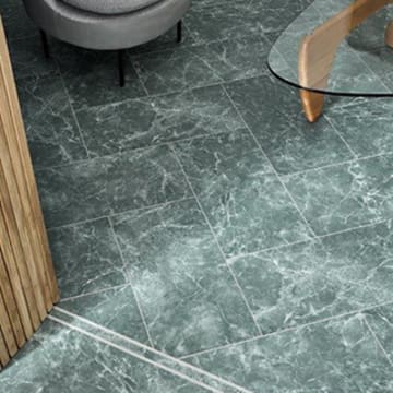 Green and white marbled square-tiled flooring