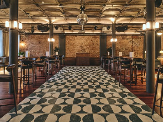 The hotel floor features Marble-effect LVT products laid in a Large Lune laying pattern, from the Amtico Signature Collection.