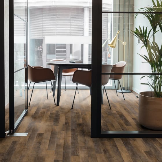 Meeting space features AR0W8370 Union Oak in Stripwood