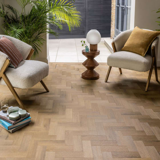 Living space features Craft Oak in Small Parquet from the Amtico Spacia Collection.