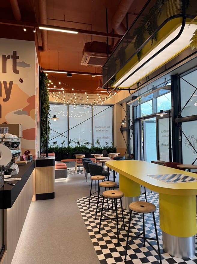 Cafe features Chequer Mono from the Amtico Décor collection.