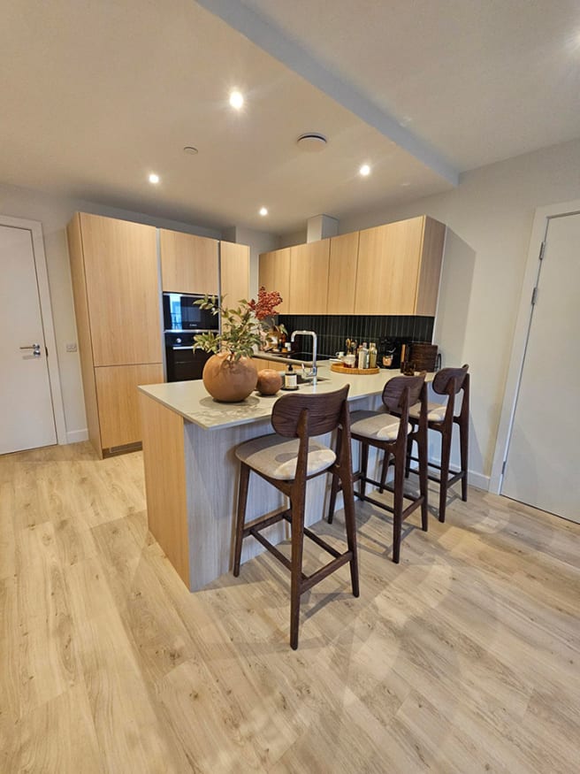 The kitchen features Springtide Oak in Amtico First Acoustic.