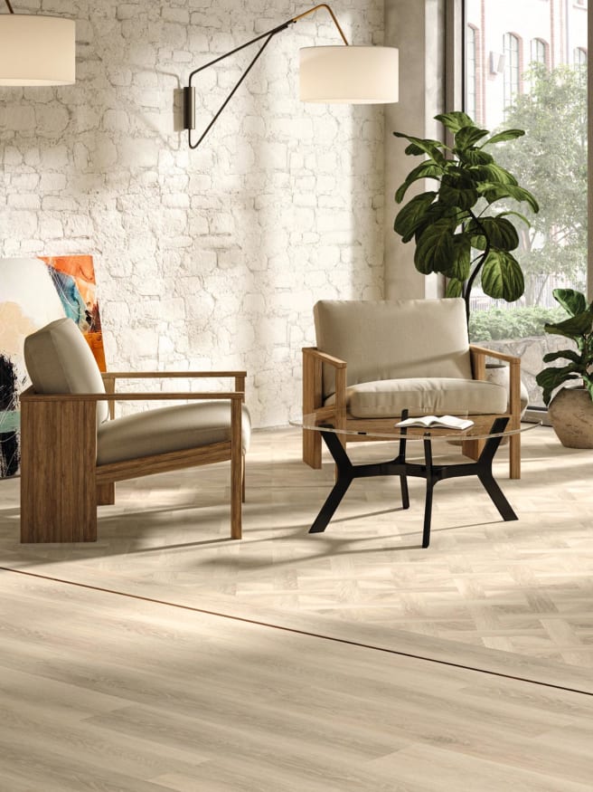 The lobby area features Foreshore Oak in Basket Weave & Stripwood, from the Amtico Form collection.