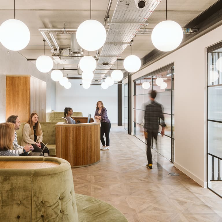 The office floor features Brushed Oak laid in French Weave, from the Amtico Signature collection.