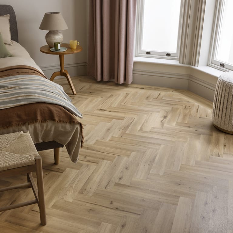 Bedroom features Amtico Tailor Oak in Large Parquet, from the Amtico Spacia collection.