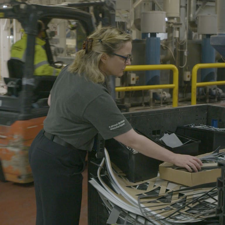 Amtico Sustainability Manager inspects production offcuts