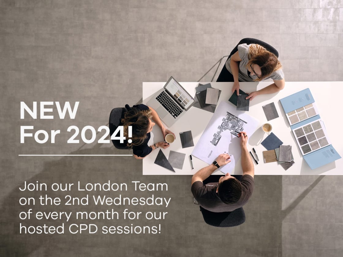 Top down view of three people sat around a table with flooring samples and plans. Text reads "New for 2023. Join our London Team on the 2nd Wednesday of every month for our hosted CPD sessions.