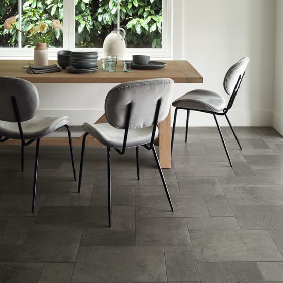 Dining room floor features Cinder in Pavestone.