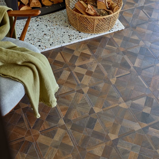 Rich, dark, small wood-effect floor planks in a lattice pattern