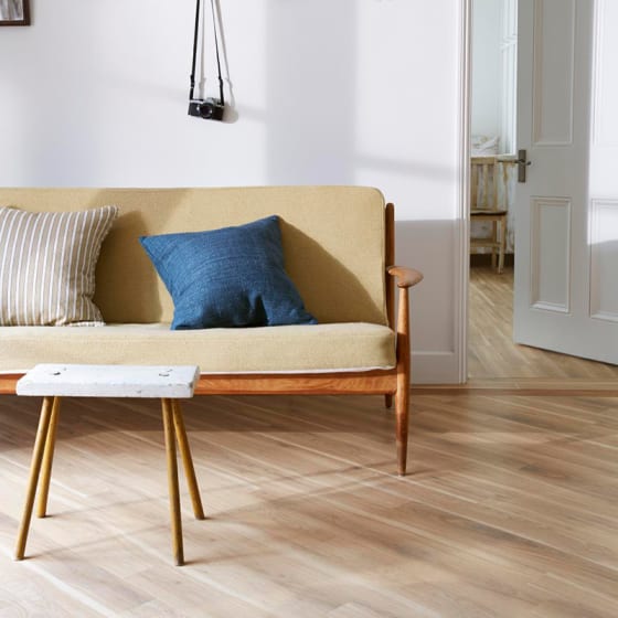 Scandi lounge with Amtico Eden Oak flooring in simple Stripwood pattern
