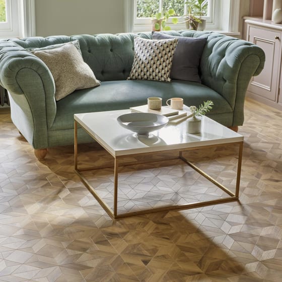 Traditional sitting room with detailed parquet flooring in a Victorian Star pattern