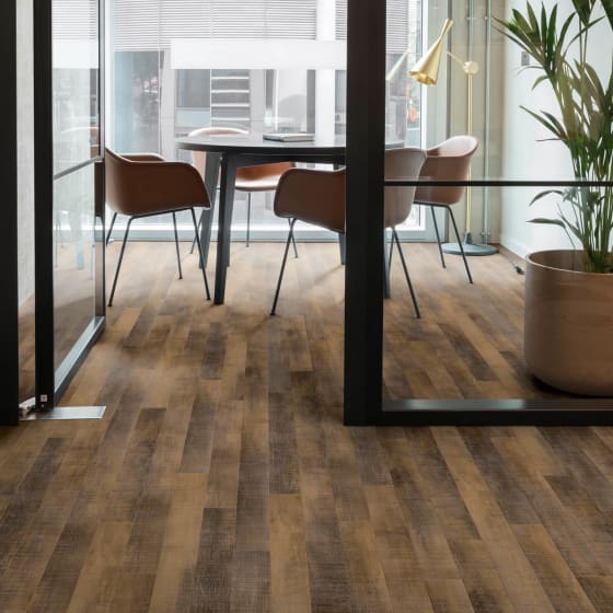 Office meeting room featuring Amtico Union Oak flooring in Stripwood pattern